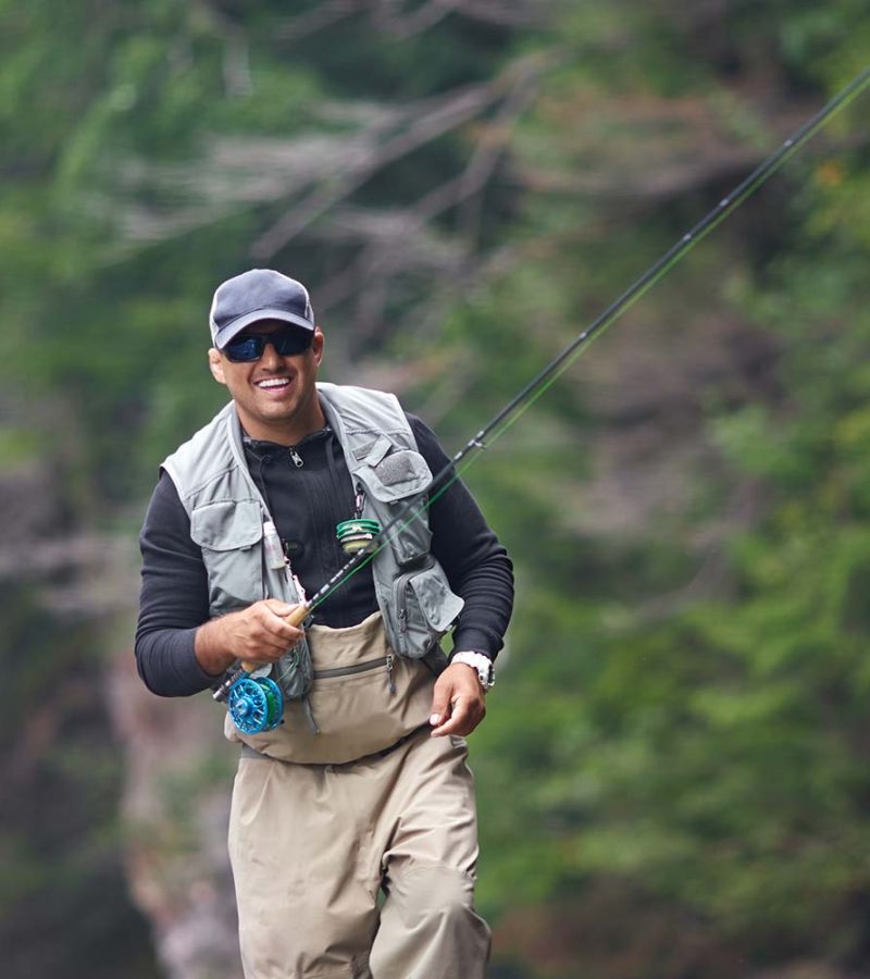cheerful-man-fishing-in-rough-mountain-river-5SZKGVB-resize.jpg
